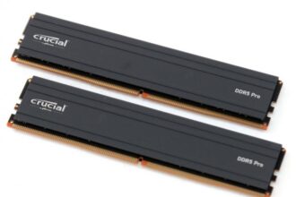 Crucial DDR5 Pro RAM sticks with low-profile heat spreaders installed on a gaming motherboard, showcasing their sleek design for gamers and creatives.